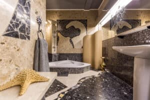 Bathroom remodeling checklist with tile samples and fixtures